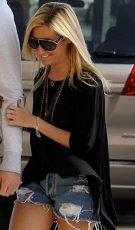 Ashley Tisdale wearing Carrera Safari Sunglasses